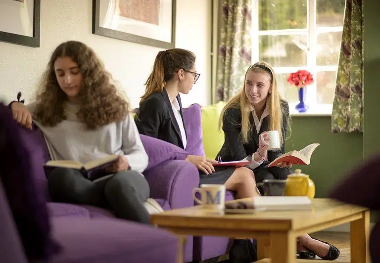 children at reading on sofas