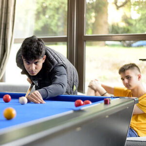children playing pool